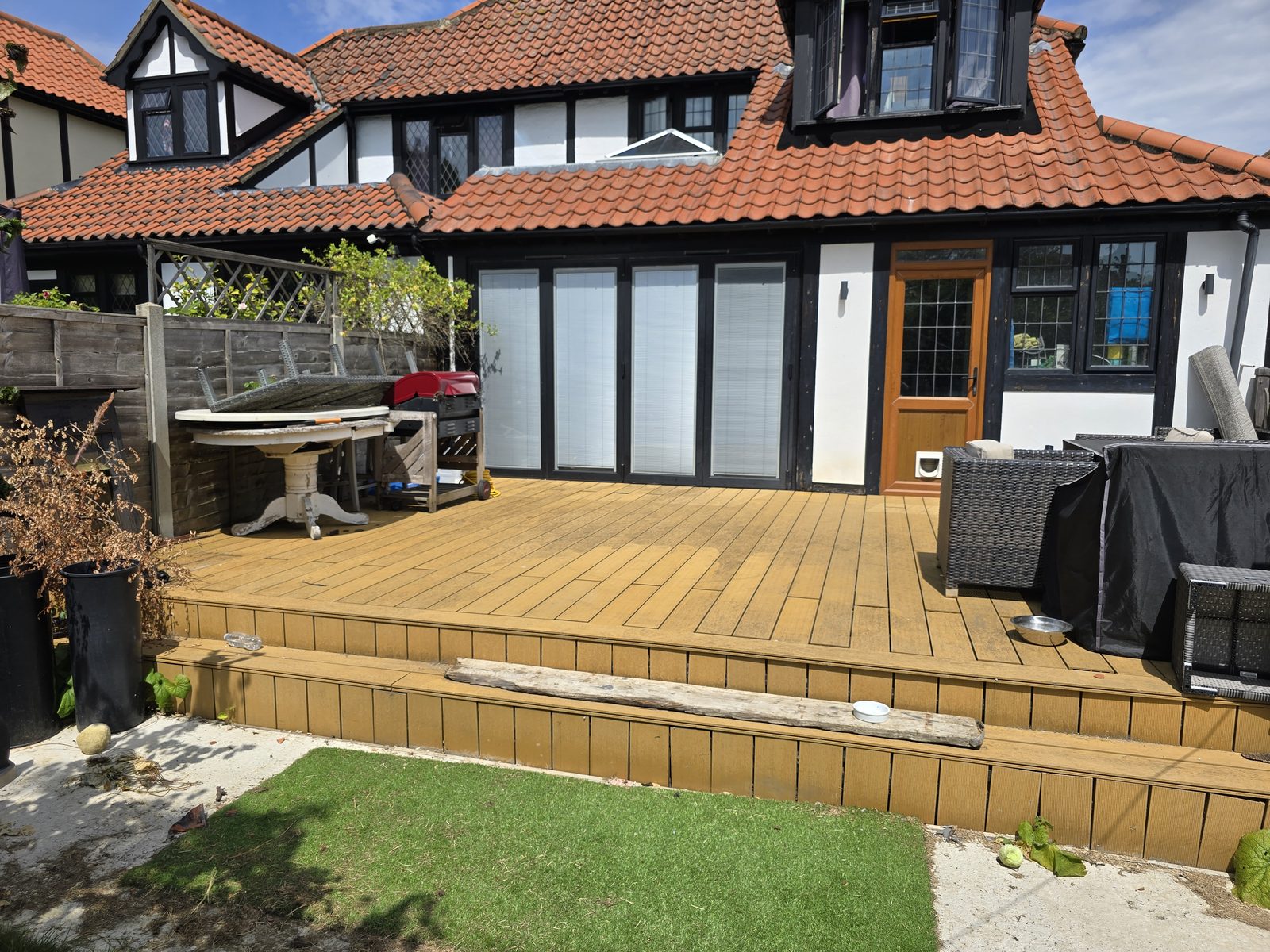 Composite decking cleaned by SafeTouch in an Essex garden